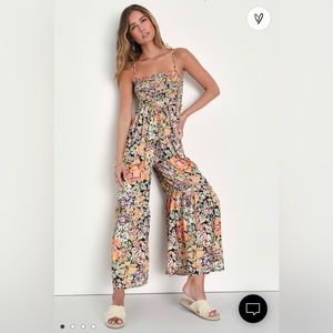 Lulus Escape to the Islands Black Floral Smocked Sleeveless Jumpsuit sz M